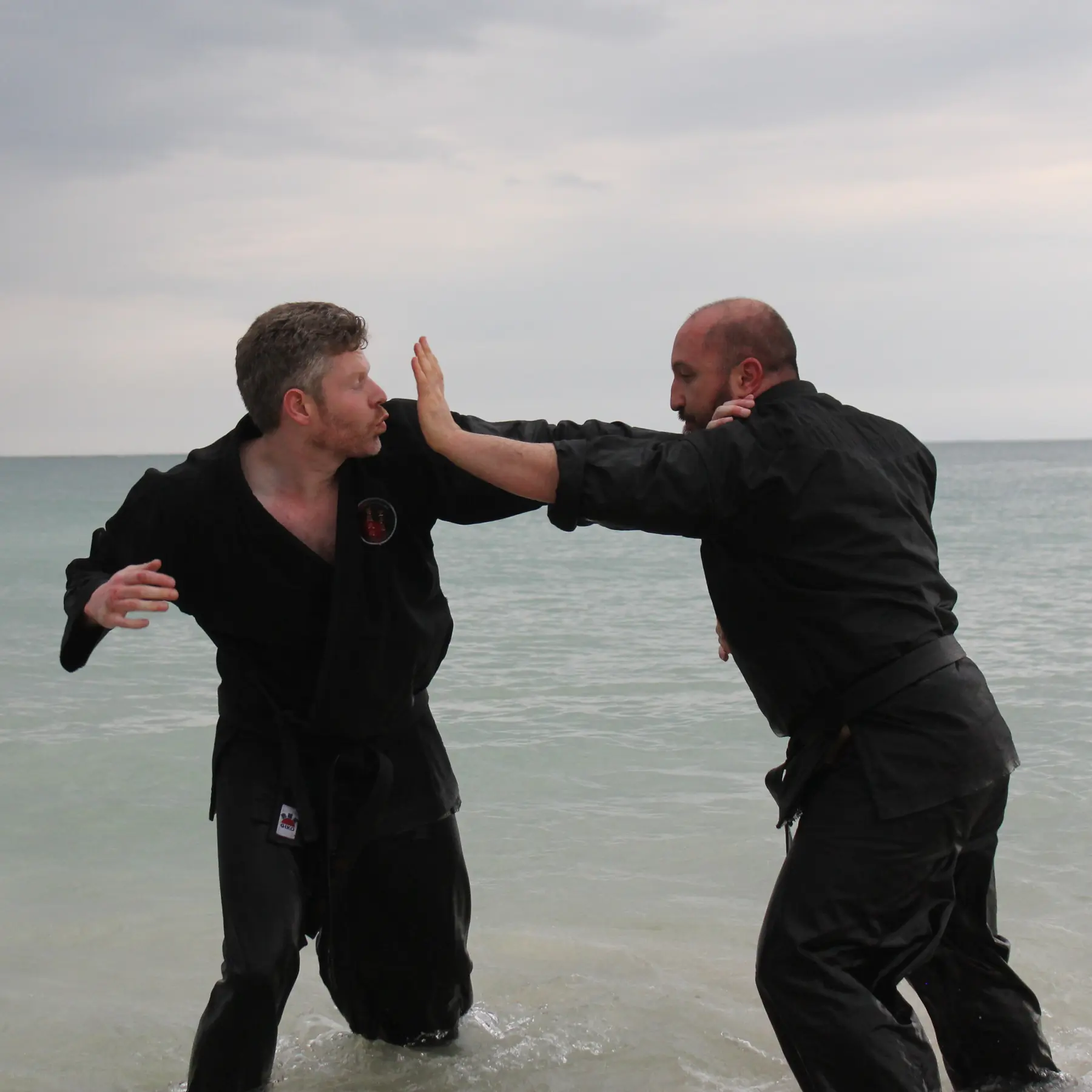 Olgun sparring with John Wetherell Sensei [4th Dan Karate & Black Sash Wing Chun Kung Fu]